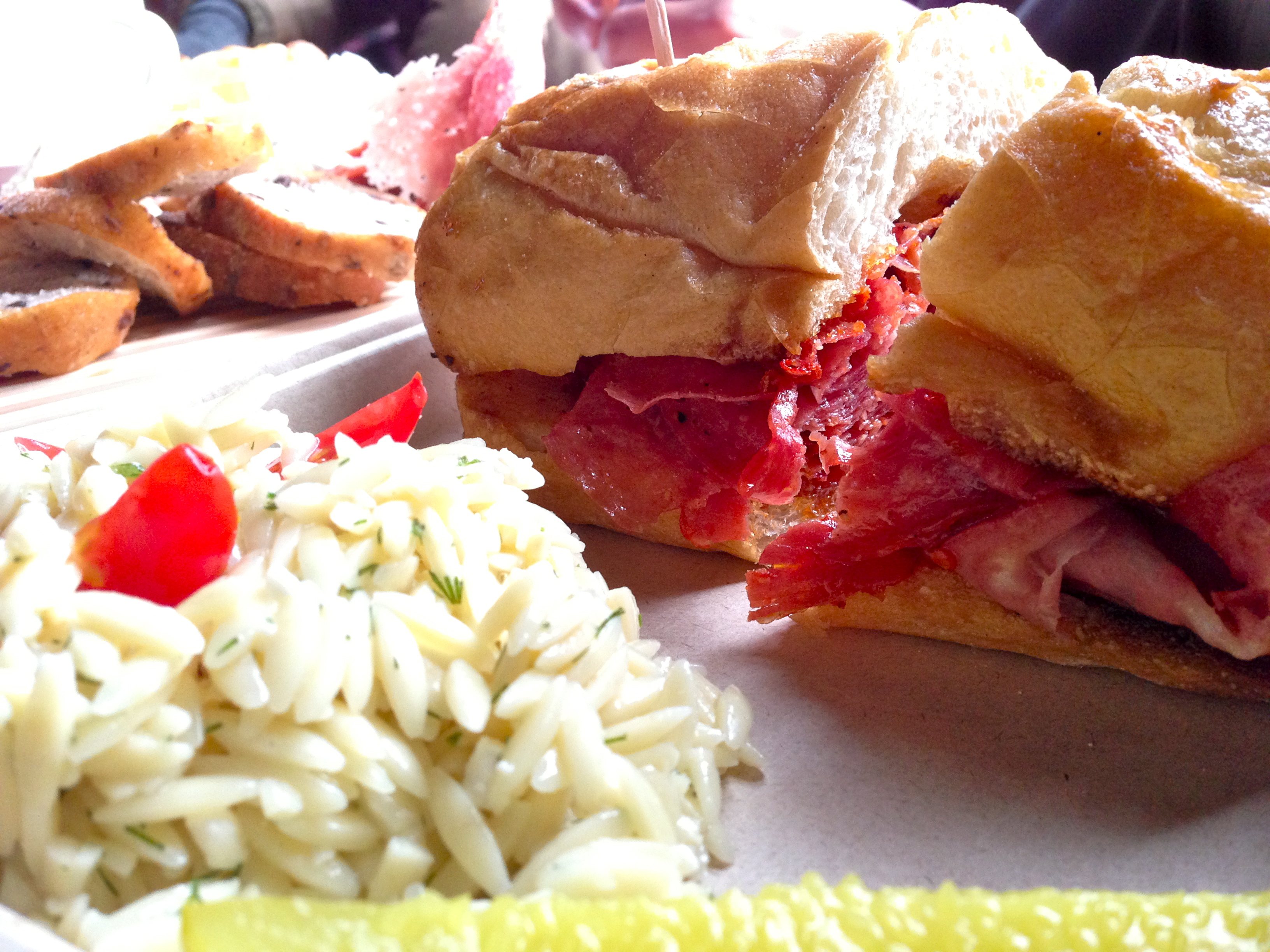 Hot Italian sub on warm, crispy bread and orzo salad, $10